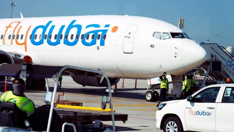 FILE-Workers-prepare-a-FlyDubai-flight-at-Dubai-International-Airport-in-Dubai-United-Arab-Emirates.jpeg