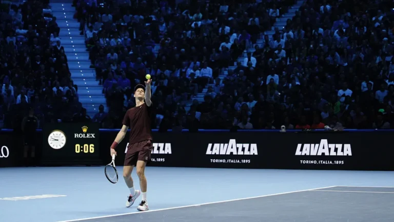 italy-s-jannik-sinner-serves-against-canada-s-felix-auger-aliassime-during-the-singles-tennis-match.webp