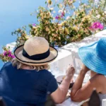santorini-greece-20-september-2023-two-ladies-in-a-restaurant-on-santorini-in-greece-during-nice-wea.webp