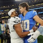 Los-Angeles-Chargers-quarterback-Justin-Herbert-10-hugs-Philadelphia-Eagles-quarterback-Jalen-Hurts.jpeg