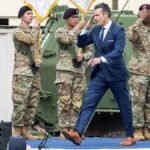NO-FILM-NO-VIDEO-NO-TV-NO-DOCUMENTARY-Defense-Secretary-Pete-Hegseth-takes-the-stage-before-Presiden.jpeg