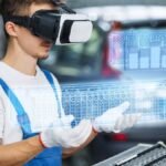 Serviceman-using-virtual-reality-for-electric-car-battery-diagnostics-model-released-Symbolfoto-prop.jpeg