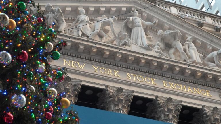 The-New-York-Stock-Exchange-is-seen-next-to-a-Christmas-tree-in-the-Financial-District-in-Manhattan.jpeg