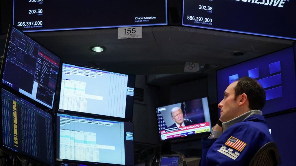 A-specialist-trader-works-at-his-post-on-the-floor-at-the-New-York-Stock-Exchange-NYSE-in-New-York-C.jpeg
