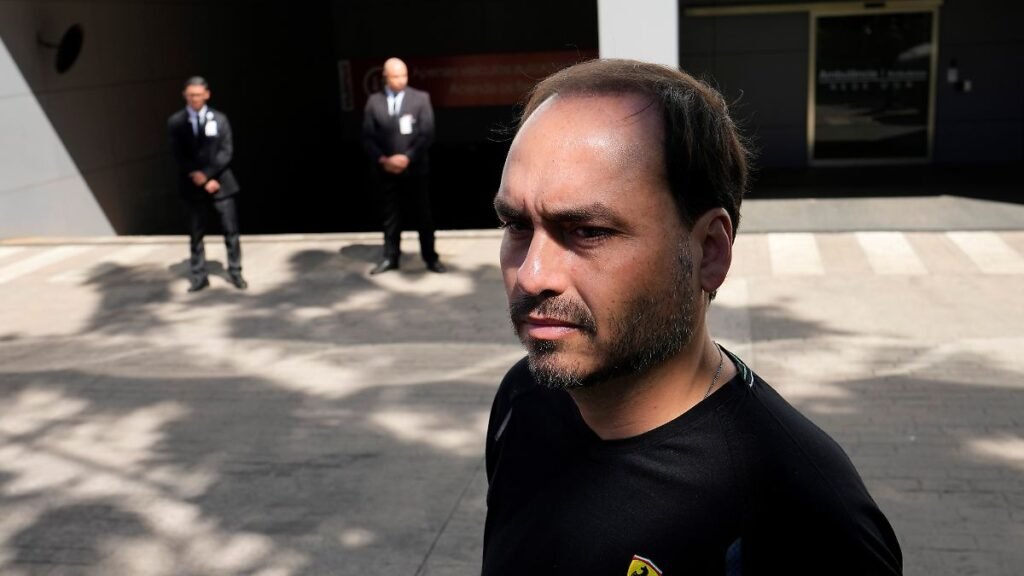 Carlos-Bolsonaro-the-son-of-former-President-Jair-Bolsonaro-awaits-his-arrival-in-front-of-the-hospi.jpeg