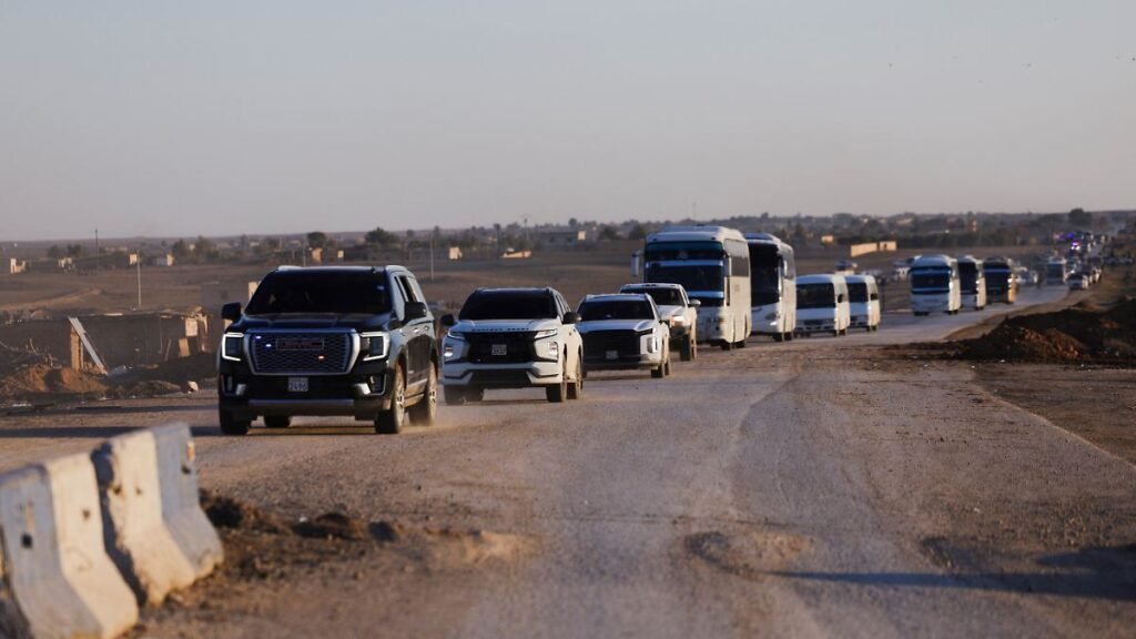 Vehicles-carrying-members-of-the-Syrian-army-head-to-Al-Hasakah-following-the-withdrawal-of-the-Syri.jpeg