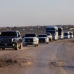 Vehicles-carrying-members-of-the-Syrian-army-head-to-Al-Hasakah-following-the-withdrawal-of-the-Syri.jpeg