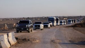Vehicles-carrying-members-of-the-Syrian-army-head-to-Al-Hasakah-following-the-withdrawal-of-the-Syri.jpeg
