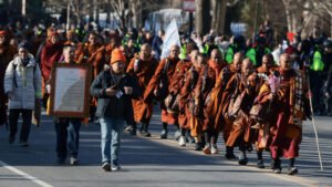 2026-02-10T210240Z-547250110-RC28JJAD8J79-RTRMADP-3-USA-MONKS-PEACE-WALK.jpg