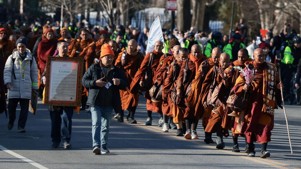 2026-02-10T210240Z-547250110-RC28JJAD8J79-RTRMADP-3-USA-MONKS-PEACE-WALK.jpg