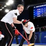 260216-CORTINA-D-AMPEZZO-Feb-16-2026-Xinhua-Marc-Kennedy-of-Canada-competes-during-the-curling-men-r.jpeg