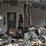 A-firefighter-works-at-a-car-dealership-damaged-by-a-Russian-drone-attack-Odesa-Ukraine-February-13.jpeg
