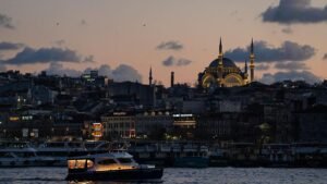 A-vessel-sails-along-the-Bosphorus-Strait-as-the-Ottoman-Al-Noor-Mosque-appears-in-the-background.jp_.jpeg