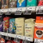 Coffee-packages-with-their-price-tags-are-on-display-on-a-shelf-at-a-supermarket-in-Union-City-New-J.jpeg