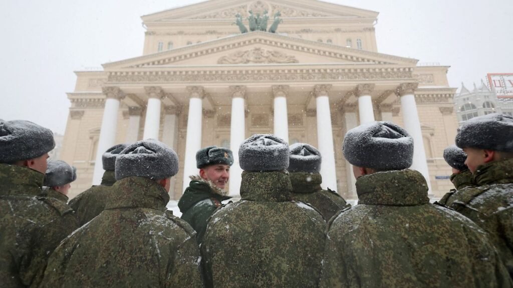 Russian-service-members-stand-next-to-the-Bolshoi-Theatre-during-heavy-snowfall-in-Moscow-Russia-Jan.jpeg