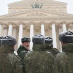 Russian-service-members-stand-next-to-the-Bolshoi-Theatre-during-heavy-snowfall-in-Moscow-Russia-Jan.jpeg
