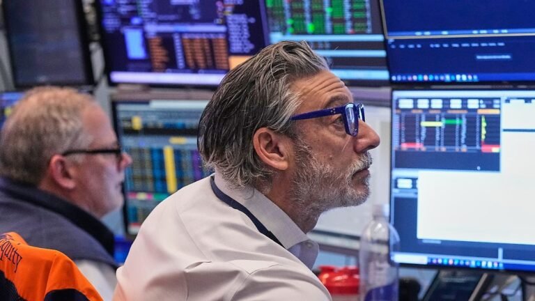 Trader-John-Romolo-right-works-on-the-floor-of-the-New-York-Stock-Exchange-Tuesday-Feb-3-2026.jpg