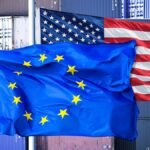 EU-And-US-Flag-In-Front-Of-Stacked-Containers-Customs-Dispute-And-Customs-Agreement-Between-EU-And-U.jpeg