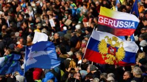 People-take-part-in-a-pro-Russian-anti-war-demonstration-during-the-Munich-Security-Conference-MSC-i.jpeg