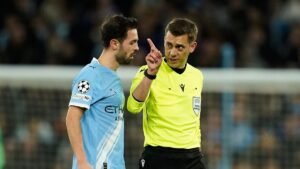 Referee-Clement-Turpin-talks-with-Manchester-City-s-Bernardo-Silva-before-checking-the-VAR-for-a-red.jpeg