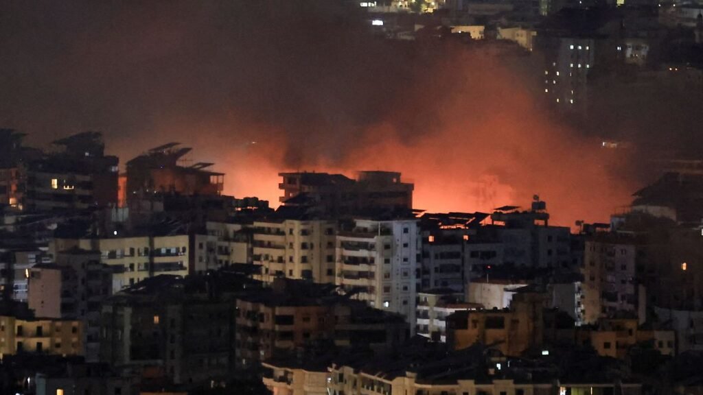 Smoke-billows-after-reported-strikes-on-Beirut-s-southern-suburbs-following-an-escalation-between-He.jpeg