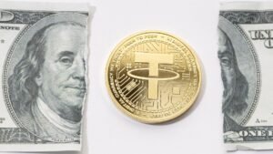 Tether-USDT-coin-and-ripped-dollar-bill.jpg