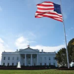 a-large-american-flag-flies-on-the-north-lawn-of-the-white-house-in-washington-dc-us-november-11-202.webp