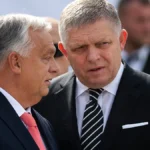 hungarys-prime-minister-viktor-orban-left-and-his-slovakian-counterpart-robert-fico-talk-to-each-oth.webp