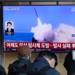 A-TV-screen-shows-a-file-image-of-North-Korea-s-missile-launch-during-a-news-program-at-Seoul-Railwa.jpeg