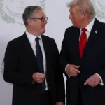 president-donald-trump-and-british-prime-minister-keir-starmer-speak-as-they-pose-for-a-photo-in-sha.webp