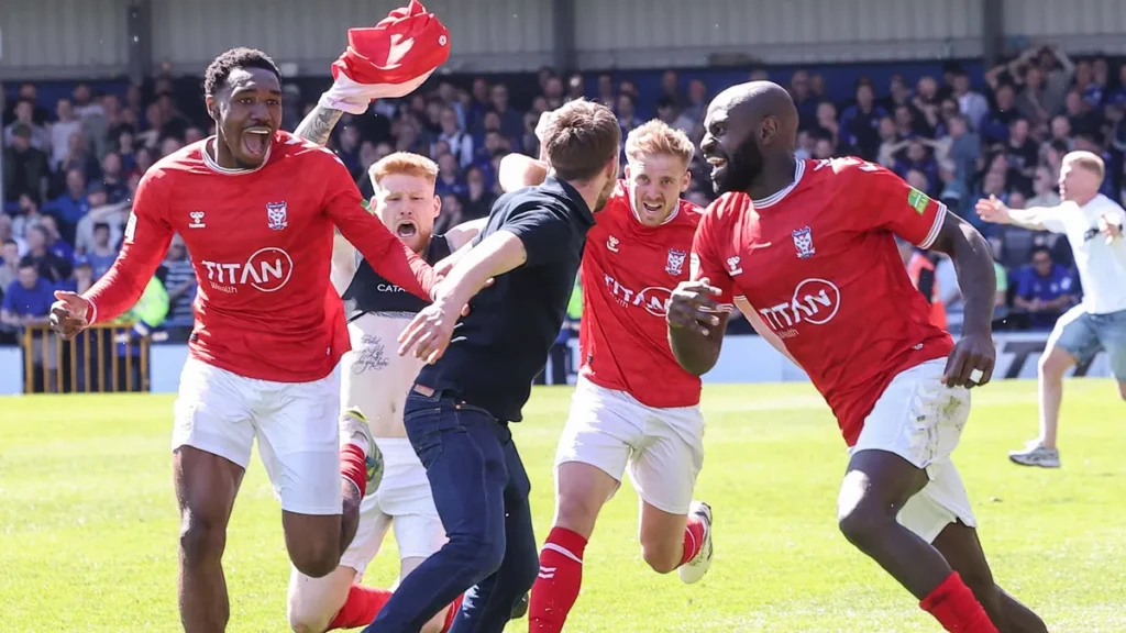 rochdale-v-york-city-enterprise-national-league-york-city-players-celebrate-after-scoring-to-make-it.webp