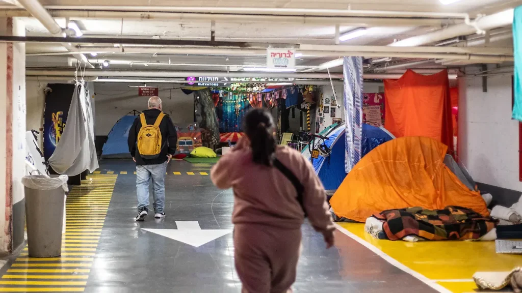 tel-aviv-israel-april-7-residents-take-shelter-in-parking-garages-as-sirens-sounded-frequently-amid.webp