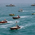 Iran-Bushehr-Persian-Gulf-Coast-Iranian-speedboats-of-the-Basij-Resistance-Mobilization-Force-a-para.jpeg