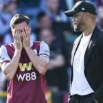 Jack-Cork-of-Burnley-and-Vincent-Kompany-Manager-of-Burnley-FC-react-after-their-sides-loss-and-Prem.jpeg