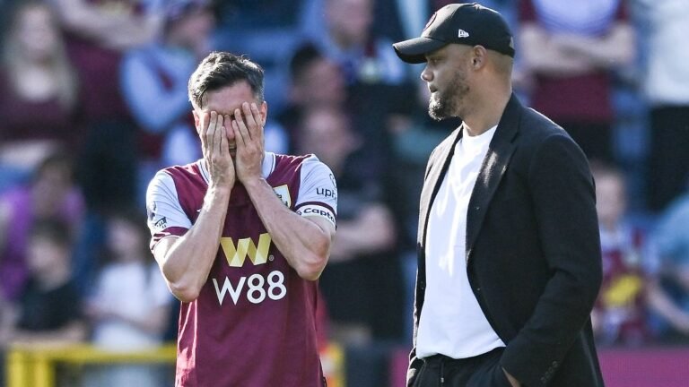 Jack-Cork-of-Burnley-and-Vincent-Kompany-Manager-of-Burnley-FC-react-after-their-sides-loss-and-Prem.jpeg