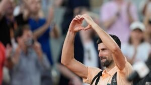 Novak-Djokovic-of-Serbia-reacts-as-he-leaves-the-court-after-the-third-round-men-s-singles-tennis-ma.jpeg