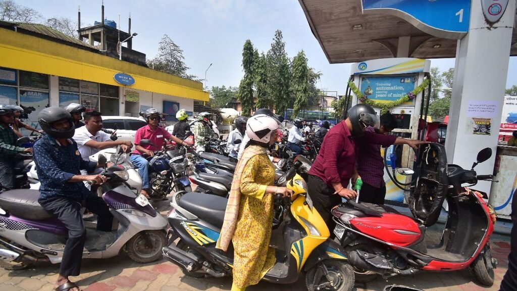 People-queue-to-fill-petrol-in-their-two-wheelers-at-a-fuel-station-in-Nagaon-District-Assam-India-o.jpeg