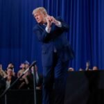 U-S-President-Donald-Trump-reacts-after-delivering-remarks-at-Rockland-Community-College-in-Suffern.jpeg