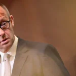 bundeskanzler-friedrich-merz-cdu-spricht-waehrend-des-ihk-tags-zum-thema-wie-wird-wirtschaft-en-in-d.webp