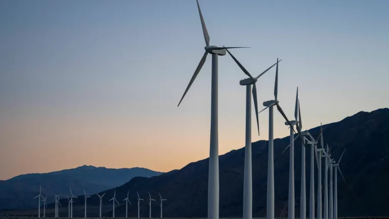 december-7-2025-palm-springs-california-usa-wind-turbines-stand-above-the-desert-at-dusk-in-the-san.webp
