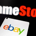 gamestop-makes-bold-56-billion-play-for-ebay-the-ebay-logo-appears-on-a-smartphone-screen-and-the-ga.webp