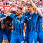 jubel-nach-dem-tor-zum-1-3-durch-jan-schoeppner-1-fc-heidenheim-3-jubelnd-bejubelt-jubelt-jubeln-emo.webp