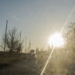 A-car-drives-on-a-road-covered-with-anti-drone-netting-to-protect-against-drone-attacks-in-the-easte.jpeg