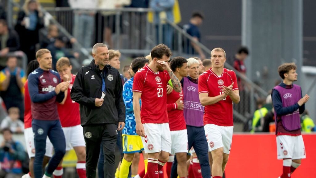 Denmark-s-goalkeeper-Filip-Joergensen-Pierre-Emile-Hoejbjerg-and-Rasmus-Nissen-Kristensen-greet-the.jpeg