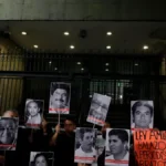 journalists-protest-with-photographs-outside-the-ministry-of-the-interior-in-mexico-city-to-demand-j.webp