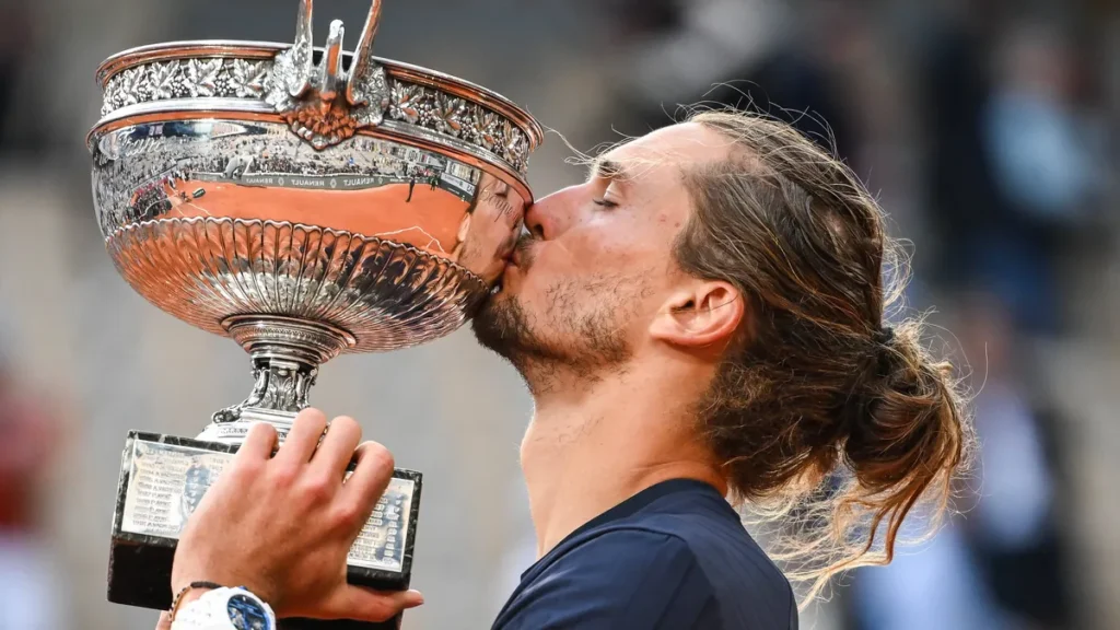 june-7-2026-paris-france-france-alexander-zverev-of-germany-celebrates-his-victory-with-the-trophy-d.webp