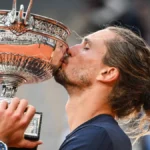 june-7-2026-paris-france-france-alexander-zverev-of-germany-celebrates-his-victory-with-the-trophy-d.webp