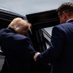 CHIPPEWA-COUNTY-WISCONSIN-JUNE-05-U-S-President-Donald-Trump-gets-in-an-armored-SUV-after-landing-at.jpeg