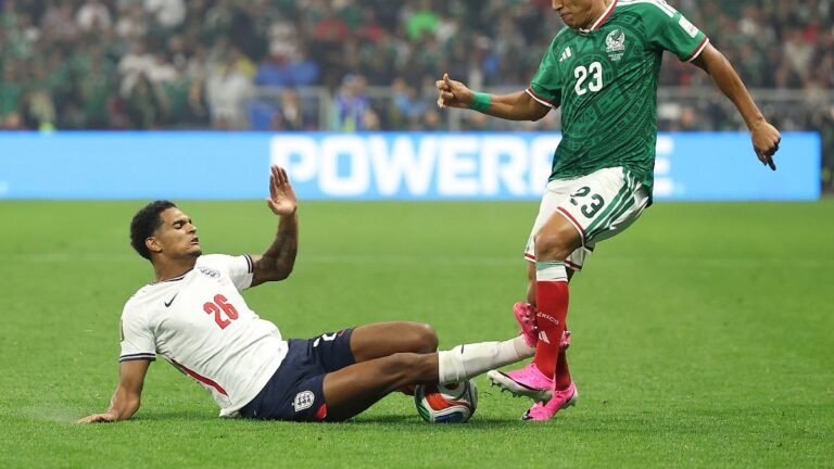 MEXICO-CITY-MEXICO-JULY-05-Jesus-Gallardo-23-of-Mexico-is-tackled-by-Jarell-Quansah-26-of-England-du.jpeg