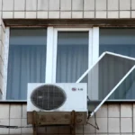 aftermath-of-russian-drone-attack-in-kyiv-a-window-with-an-ac-is-in-a-residential-building-in-the-sv.webp